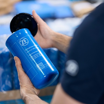 ZF oil filter held by a man