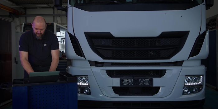 man next to truck running diagnostic session with ZF Scan