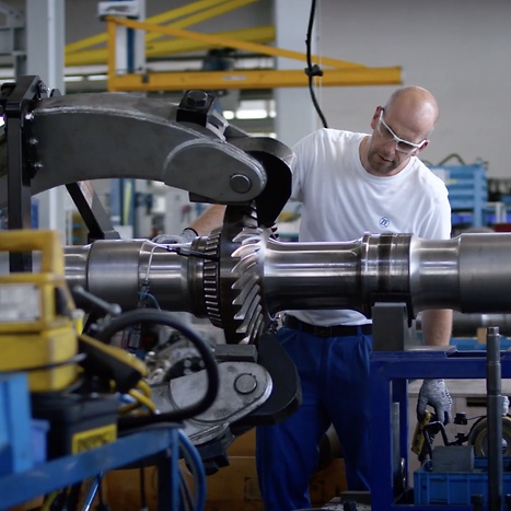 Working on rail part in workshop