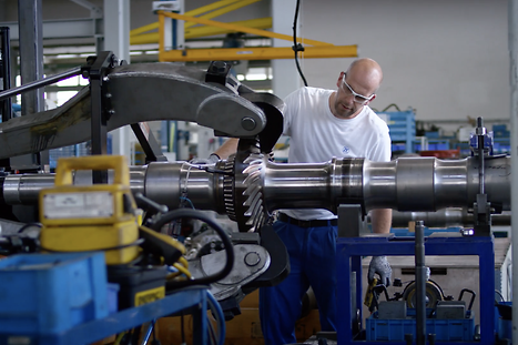 Working on rail part in workshop