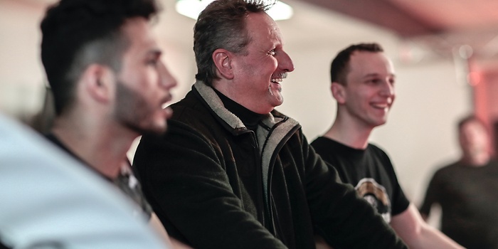 trw three mechanics smiling