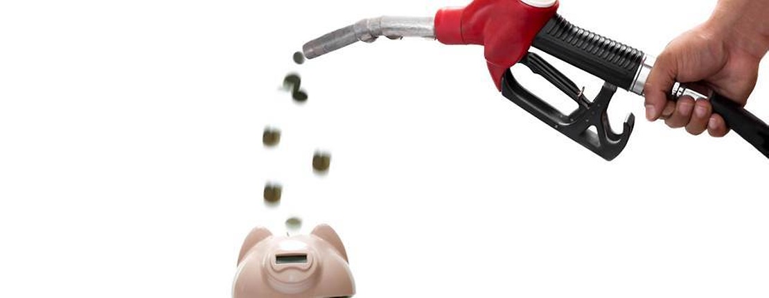 piggy bank and fuel pump