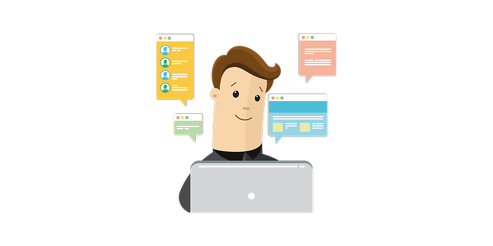 Man infront of computer interacts with customer 
